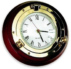 SOLID BRASS PORTHOLE CLOCK ON MAHOGANY