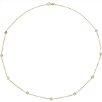 Diamond Essence Nine Station Necklace With Round Brilliant Bezel-set Stones,
2.25 Cts.T.W. in 14K Solid Yellow Gold.