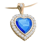 Gold pendant of blue sapphire & round stones