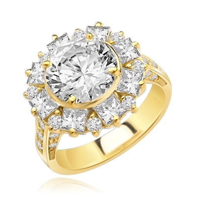 Classic Designer Ring with 3.0 Cts. Round Brilliant Diamond Essence Stone in the center, surrounded by 0.5 Ct. each Princess cut stones and round stones. Round melee set on band, makes it more artistic. 7.25 Cts.T. W. set in 14K Solid Yellow Gold.