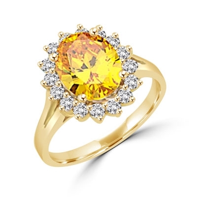 Light your fire with this Cocktail Ring,3 cts. Oval cut Canary Diamond Essence Center and accents encircling the fireworks! 3.5 Cts. T.W. set in 14K Solid Yellow Gold.