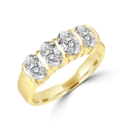 Mesmerizing Band that is artfully decorated with four matching Oval Cut Diamond Essence Masterpieces. 2 Cts. T.W. in 14K Solid Gold.