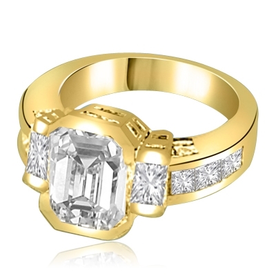 Not for the shy - this exquisite Ring with a 4 Ct. Bezel Set Radiant Emerald Cut Diamond Essence Masterpieces in the center and Princess Cut accents on both sides. 6 Cts. T.W, in 14K Solid Gold.