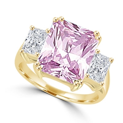 Pink Essence emerald-cut 8 carat Pink stone set in 14K Solid Gold with side baguettes. 8.5 cts. T.W.