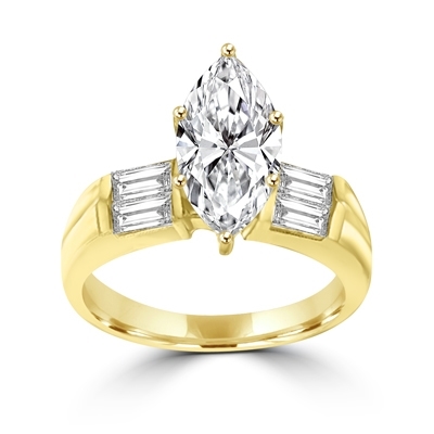 A dazzling one-carat marquise-cut Diamond Essence gem with bold baguettes. 1.5 cts. t.w., in 14K Solid Gold.