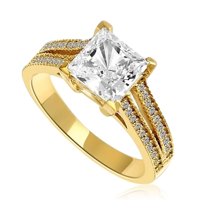 Diamond Essence Ring with Princess in Center accompanied by two rows of melee on each side. 3.25 Cts T.W. set in 14 K solid Yellow Gold.