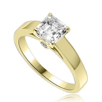 Diamond Essence Asscher cut Solitaire Ring artistically set in a wide band with a beautiful accent on both sides to enhance the looks. 1 ct.t.w. in 14K Solid Yellow Gold.