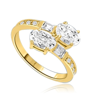 Two  Oval Essence, 1.0 ct. each, set in four prongs and accompanied by baguettes and melee on band. 2.5 Cts. T.w. In 14k Solid Yellow Gold.