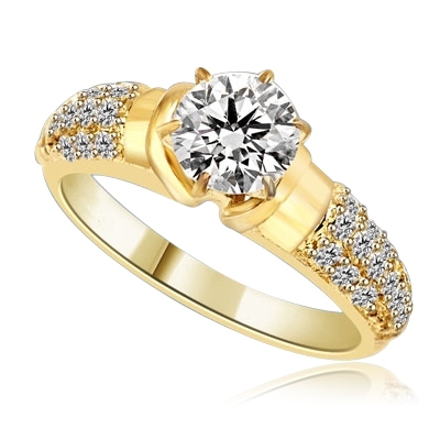Engagement Ring- Tiffany set, 1.0 Ct Round Brilliant Diamond Essence in center with cluster of sparkling Melee on the band. 1.25 Cts T.W. set in 14K Solid Yellow Gold.
