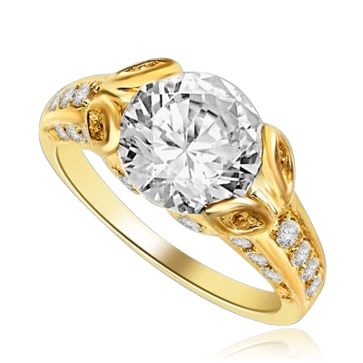 Designer Ring with Round Brilliant Diamond Essence, artistically set in leaf shaped prongs in center, set off by Melee on either side of the band. 4.0 Cts. T.W. set in 14K Solid Yellow Gold.