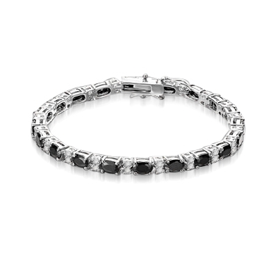 Perfect Party wear. 7" long Diamond Essence Platinum Plated Sterling Silver bracelet with Oval cut Onyx Essence, 0.5 Ct.  each set in four prongs and Diamond Essence Melee set in between for more dramatic look. 10.0 Cts.T.W.