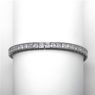 Platinum Plated Sterling Silver tennis bracelet strung with 43 princess cut masterpieces in a mesmerizing array, with double safety clasp, 12.0 cts. T.W.