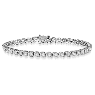 Platinum Plated Sterling Silver bracelet. Round brilliant stones set in prongs and 'S' bars setting. Appx. 6.0 cts.t.w.  A perfect tennis bracelet for party or casual wear.