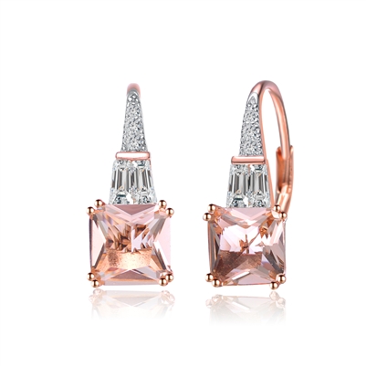 Diamond Essence Designer Earrings With 1.50 Cts. Morganite Cut Corner Princess Cut Stone And Tappered Baguettes Followed By Melee On Top, 3.50 Cts.T.W. In Rose Plated Sterling Silver.
&#8203;Approx Size Of Earrings Is 19mm Length And 7mm Width.