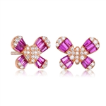 Diamond Essence Butterfly Stud Earrings With Ruby Baguettes and Round Melee, 2.10 Cts.t.w. set in Rose Plated Sterling Silver.
10mm Length  x 13mm Width.