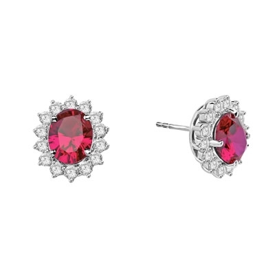 Designer Oval studs with 2.50 Cts. Ruby in center, surrounded by 14 Round Brilliant Diamond Essence Stones Appx. 6.0 Cts. T.W. set in Platinum Plated Sterling Silver.