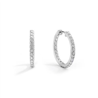 Platinum Plated Sterling Silver hoop earrings with a melee of Round cut Diamond Essence stones orbiting all around your delicate lobes. These highly flattering hoops are also hinged half way around so they can go on and come off in a flash. 2.0 cts.t.w.