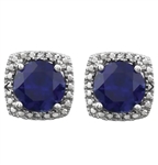 Designer Stud Earrings. One carat Sapphire Essence Round cut stone in four prongs setting and with Diamond Essence melee. 2.5 cts.t.w. in Platinum Plated Sterling Silver.