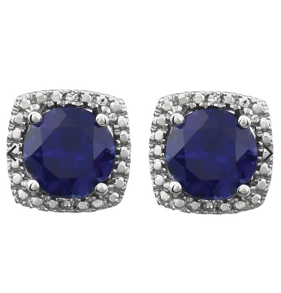 Designer Stud Earrings. One carat Sapphire Essence Round cut stone in four prongs setting and with Diamond Essence melee. 2.5 cts.t.w. in Platinum Plated Sterling Silver.