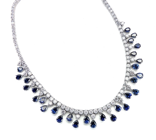 Diamond Essence dazzling Necklace, 16" long just perfect for any Occassion. 1.0 Ct. each Sapphire Essence stone dangling from Round Brilliant Diamond Essence stone. Appx. 75.0 cts.t.w. set in Platinum Plated Sterling Silver.