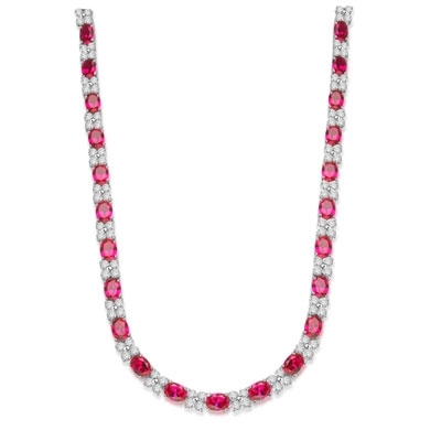 Diamond Essence Designer Necklace with 1.25 cts. Oval Ruby Essence and Round Diamond Essence Stones. Appx. 72.00 Cts. T.W. set in Platinum Plated Sterling Silver.