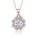 Designer pendant with 1.0 carat Round Brilliant Diamond Essence in the center, surrounded by baguettes in delicate prong setting of Rose Plated Sterling Silver. 2.0 cts.t.w.