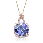 Diamond Essence Pendant with 5 Cts. Cushion cut Sapphire in Four Prongs surrounded by Brilliant Melee in Platinum Plated Over Sterling Silver.
Approx Size Of Pendant Is 20 mm Length And 12 mm Width.