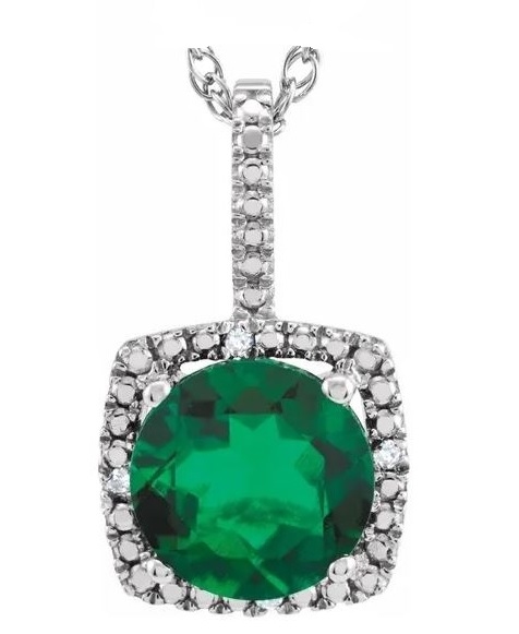 Designer Pendant With Emerald Essence Round cut stone in four prongs setting and surrounded by Diamond Essence Melee,1.50 Cts.T.W. in Platinum Plated Sterling Silver.