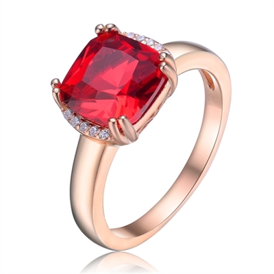 Diamond Essence Designer Ring with 2.5 carat Ruby Cushion Essence in 8 prongs setting and delicate melee set on two sides of cushion essence for additional beauty.
2.60 Cts.T.W. in Rose Plated Sterling Silver.