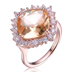 Diamond Essence Ring With Morganite Center Surrounded By Melee Set In 8 Prongs,6.50Cts.T.W. In Rose Plated Sterling Silver.
Approx Size is 20.78 Width and 26.83 Length.