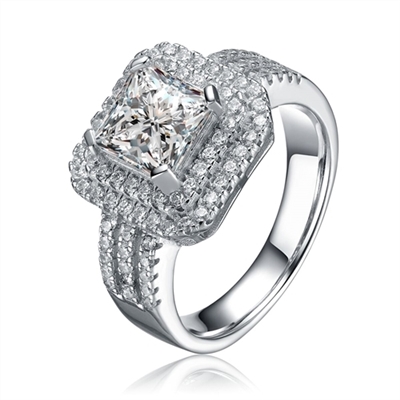 Diamond Essence 2 carat Princess cut stone set in four prongs setting, with diamond essence melee in step style delicate setting. Three rows of melee on the band, makes the ring more presentable. 3.5 cts. t.w. in Platinum Plated Sterling Silver