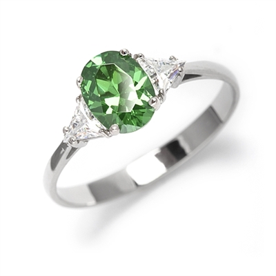 Stunning Ring, 2 Cts. T.W, with 1 Ct Oval Cut Emerald Center  and White Trilliant Diamond Essence Stones on side, in Platinum Plated Sterling Silver.