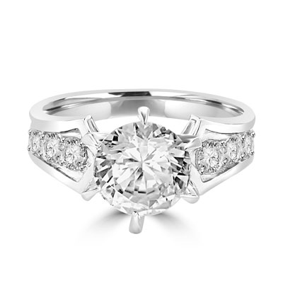 A beautiful engagement ring, Diamond Essence round brilliant stone of 2.0 carat set in six prongs and curved shank with beautiful round melees. 2.5 ct.t.w. set in Platinum Plated Sterling Silver.