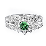 Greenpeace - 1.25 Carats Emerald Center is surrounded by supremely crafted masterpieces. In Platinum Plated Sterling Silver.