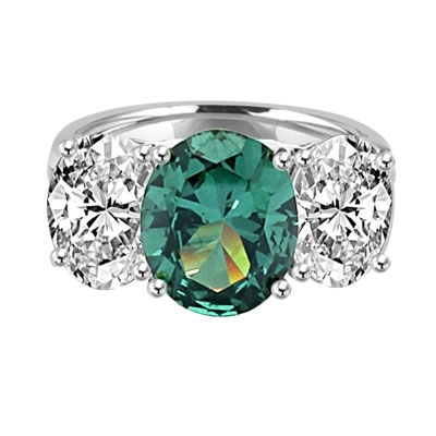 Three stone Jaw dropping oval Emerald stone ring