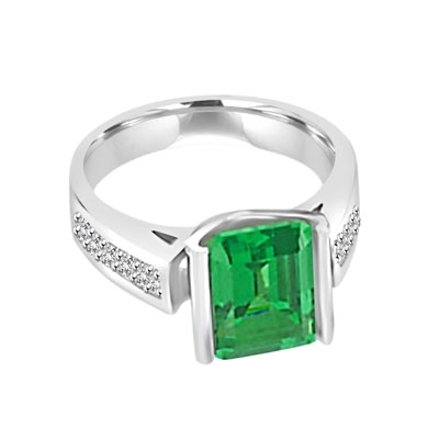 Sarabande - Impressive Ring with 4 Ct. Emerald Cut Emerald Essence Center and featuring Channel Set accents on the band. 5 Cts. T.W.
in Platinum Plated Sterling Silver.