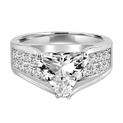 Magnificent Ring with 4Ct. Trilliant Cut Center adorning the mount on a glimmering band with melee of Round brilliant accents. 5.5 Cts. T.W. set in Platinum Plated Sterling Silver.