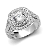 Platinum Plated Sterling Silver Diamond Essence Designer Ring With 1 Ct. Round Brilliant Center Surrounded By Melee And Three Rows Of Melee On the Band Enhance the Beauty, 2.50 Cts.T.W.
