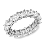 Diamond Essence Eternity Band With French Cut Stones, Approx 4 Cts.T.W. In Platinum Plated Sterling Silver.