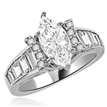 Diamond Essence Designer Ring With Marquise cut Diamond Essence, 1.50 Cts set in six prongs and Diamond Essence Melee on two sides on curved bars,The band is enhanced with Diamond Essence baguettes, 3.50 Cts.T.W. in Platinum Plated Sterling Silver.