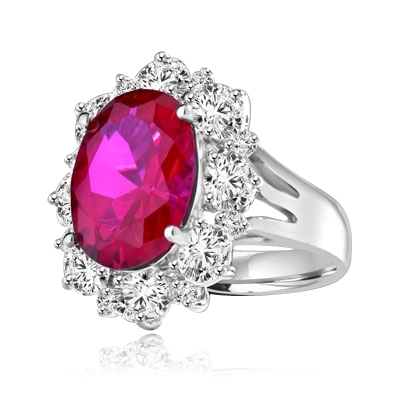 Gorgeous Ring with 8.25 Cts. Oval Cut Ruby Essence in center, surrounded by Oval cut Diamond Essence and Round Brilliant Melee. 10.25 Cts T.W. set in Platinum Plated Sterling Silver.