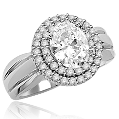 Designer ring with 2.0 Cts. Oval cut Diamond Essence in center, surrounded two rows of Melee, set in Platinum Plated Sterling Silver, approx. 2.5 Cts. T.W. Available in select Ring sizes.