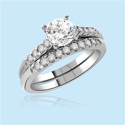 An attractive wedding band with 1.0 Ct. center approximately 5.0 Cts. T.W. in Platinum Plated Sterling Silver. Available in select Ring sizes.