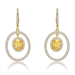 Designer Leverback Earring, with 1.5 carat oval Yellow Citrine Essence surrounded by Round Essence melee, Outlined with bigger oval setting with melee. 5.5 cts.t.w. in Gold Plated Sterling Silver.