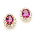 Designer Oval studs with 2.50 Cts. Ruby in center, surrounded by 14 Round Brilliant Diamond Essence Stones Appx. 6.0 Cts. T.W. set in 14K Gold Vermeil.