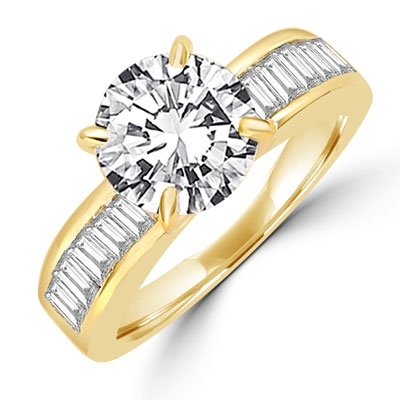 Diamond Essence Ring with 2.0 ct. Round Diamond Essence center with channel set baguettes on each side,2.5 ct. tw.in Gold Vermeil.