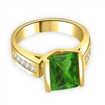 Sarabande - Impressive Ring with 4 Ct. Emerald Cut Emerald Essence Center and featuring Channel Set accents on the band. 5 Cts. T.W.
in Gold Vermeil.