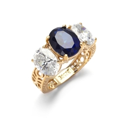 Ovalinas - Three Stone Oval Ring with 2 Ct. Oval Masterpiece on an Ethnic Band and 1.5 Ct.Oval Essence on each side, 5 ct t.w. in 14K Gold Vermeil. Center Stone changeable to Many Options.