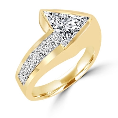 Meet the Star! Graduating Diamond Essence Brilliants ascend to kiss the beauty of shining 4 Cts. Trilliant set exqusitely on channels forming a design to behold. 4.75 Cts. T.W. in Gold Vermeil.