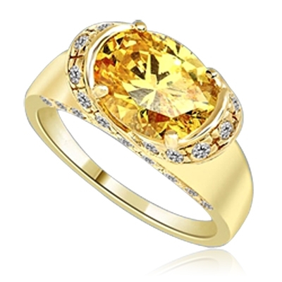 East West Ring- Oval cut Canary Essence set in center with Melee set on side setting going around in criss cross design from center, down the side of the band. 3.25 Cts T.W. set in 14K Gold Vermeil.